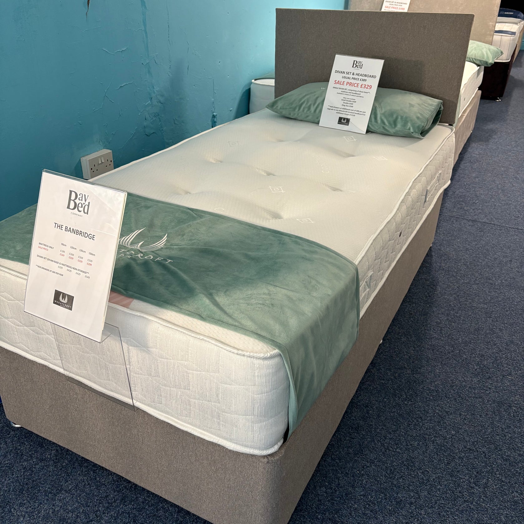 Ex-Display Single divan set with medium coil sprung mattress and square strutted headboard